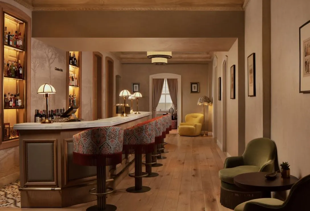 Bar counter with stools and table lamps